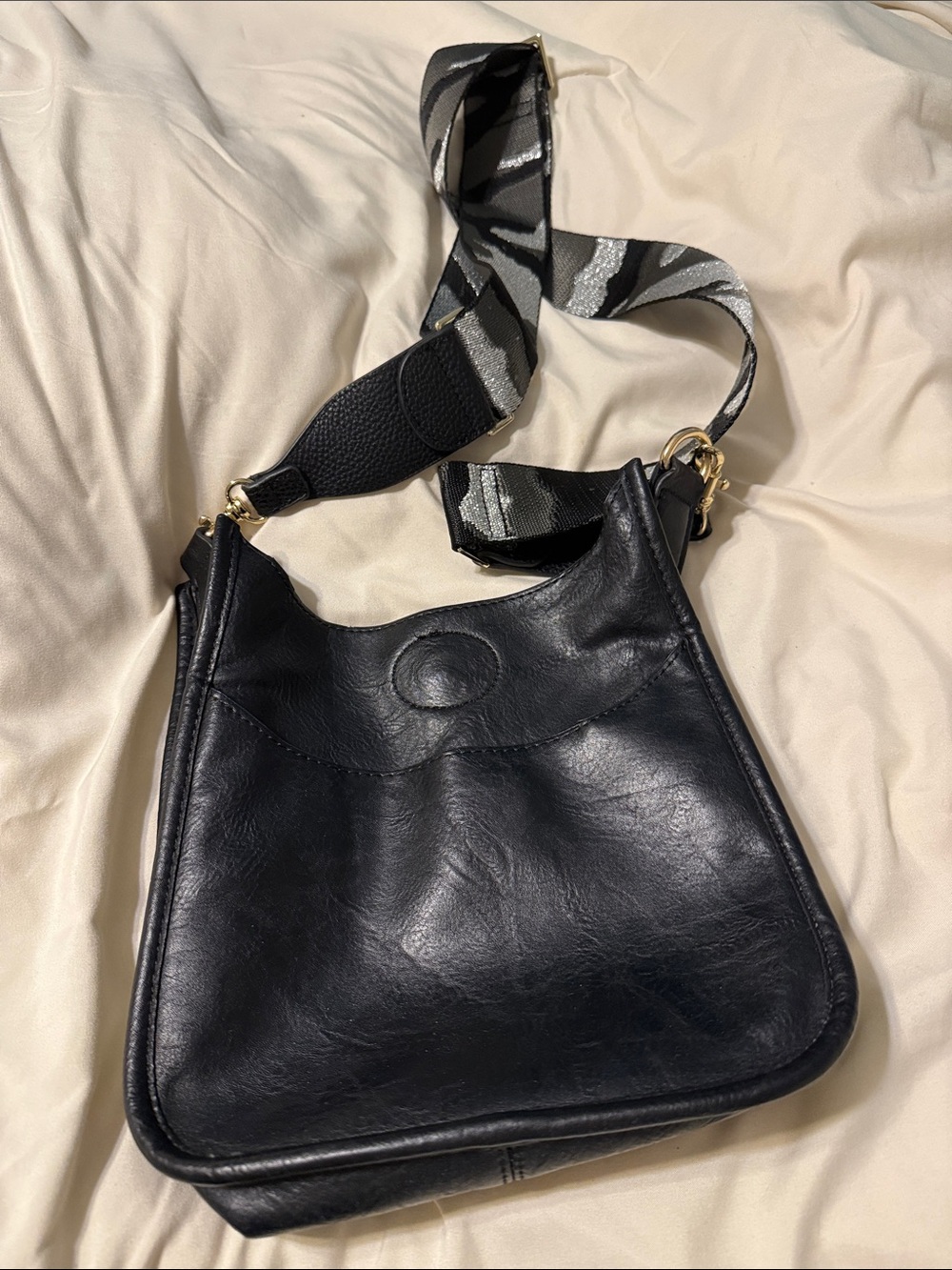 Black Leather Crossbody Bag with Patterned Strap